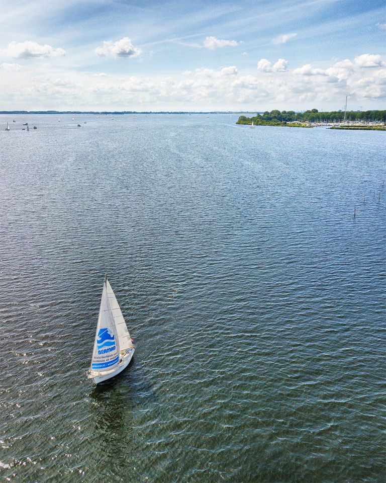 Sailing boat on lake Gooimeer