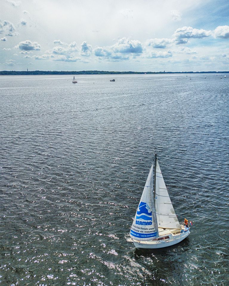 Sailing boat on lake Gooimeer