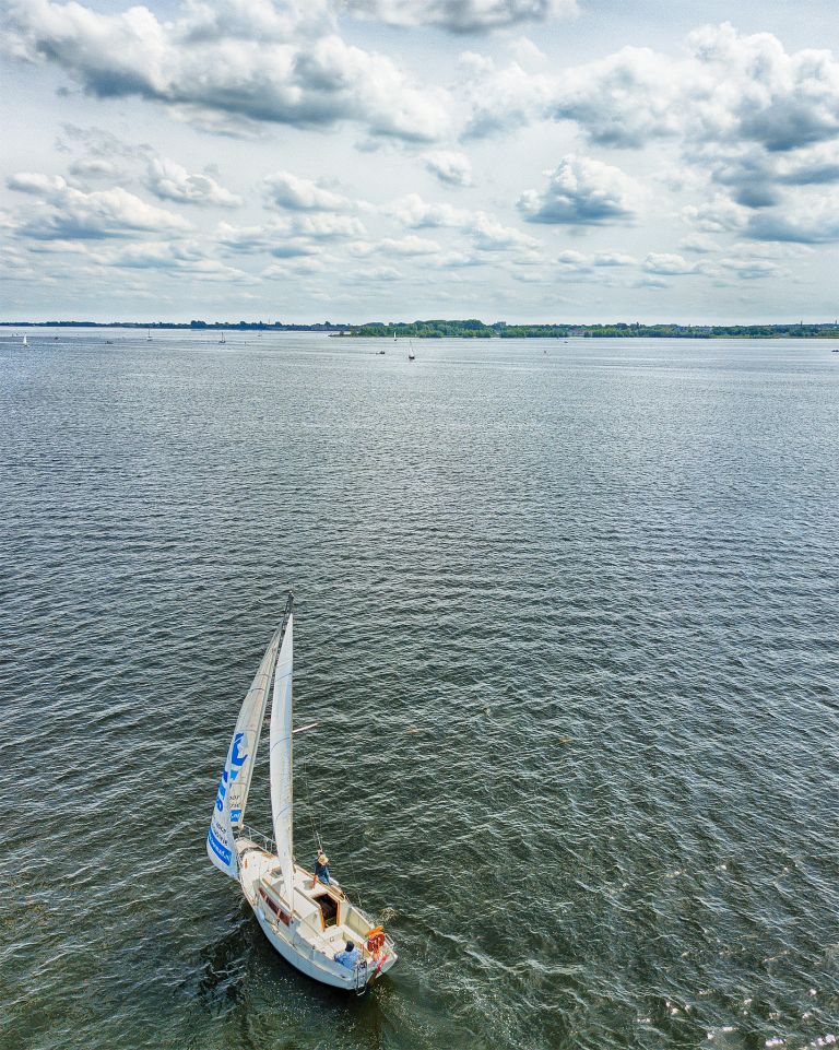 Sailing boat on lake Gooimeer