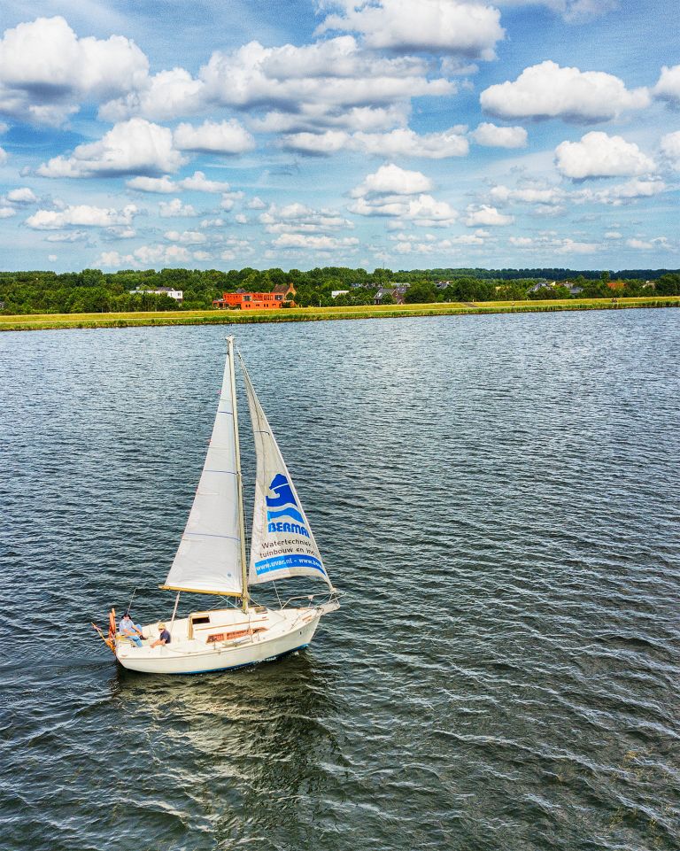 Sailing boat on lake Gooimeer