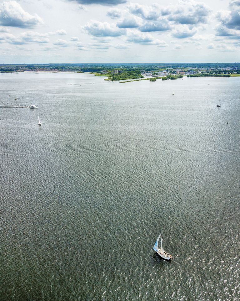 Sailing boats on lake Gooimeer