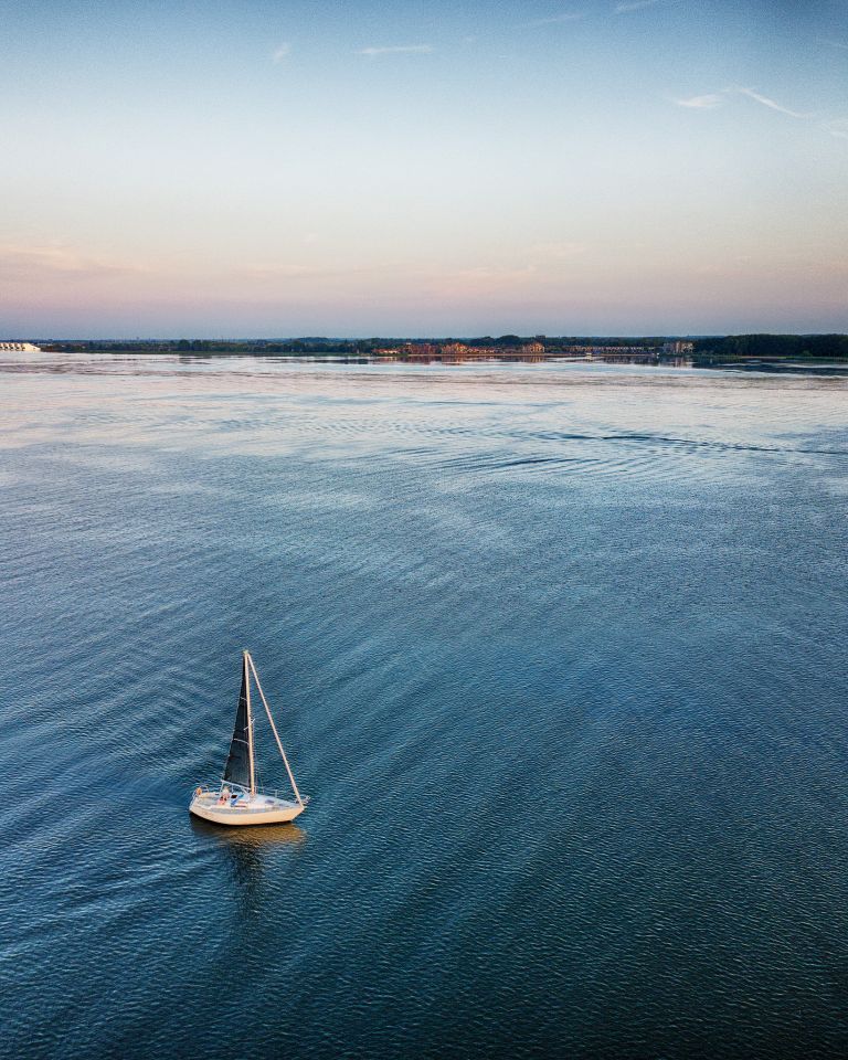 Sailing boat on lake Gooimeer