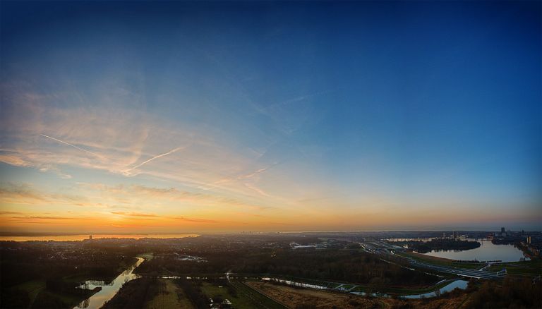 Sunset drone panorama near Almere Castle