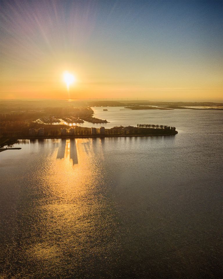 Drone sunset over lake Noorderplassen