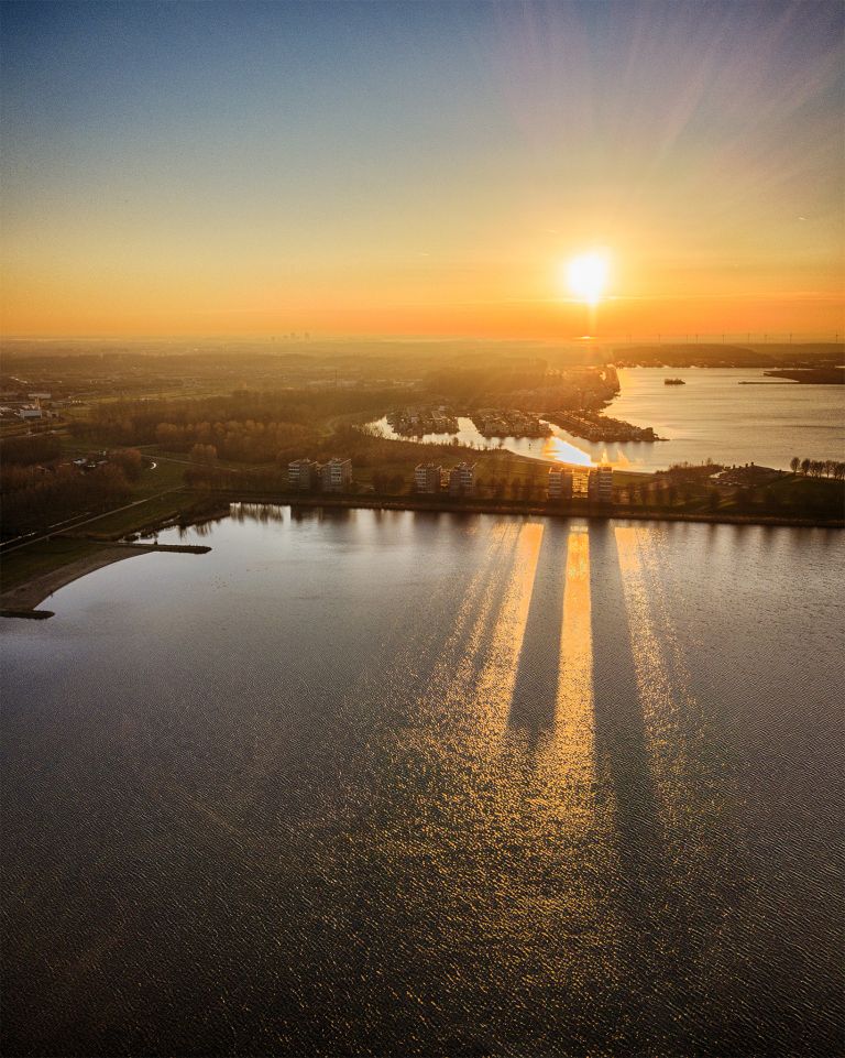 Drone sunset over lake Noorderplassen