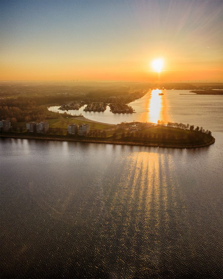 Drone sunset over lake Noorderplassen