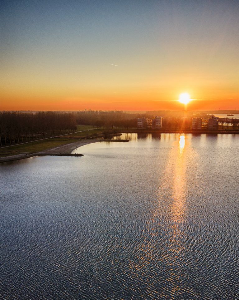 Drone sunset over lake Noorderplassen