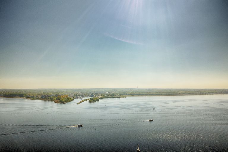 Sailing boats on lake Gooimeer