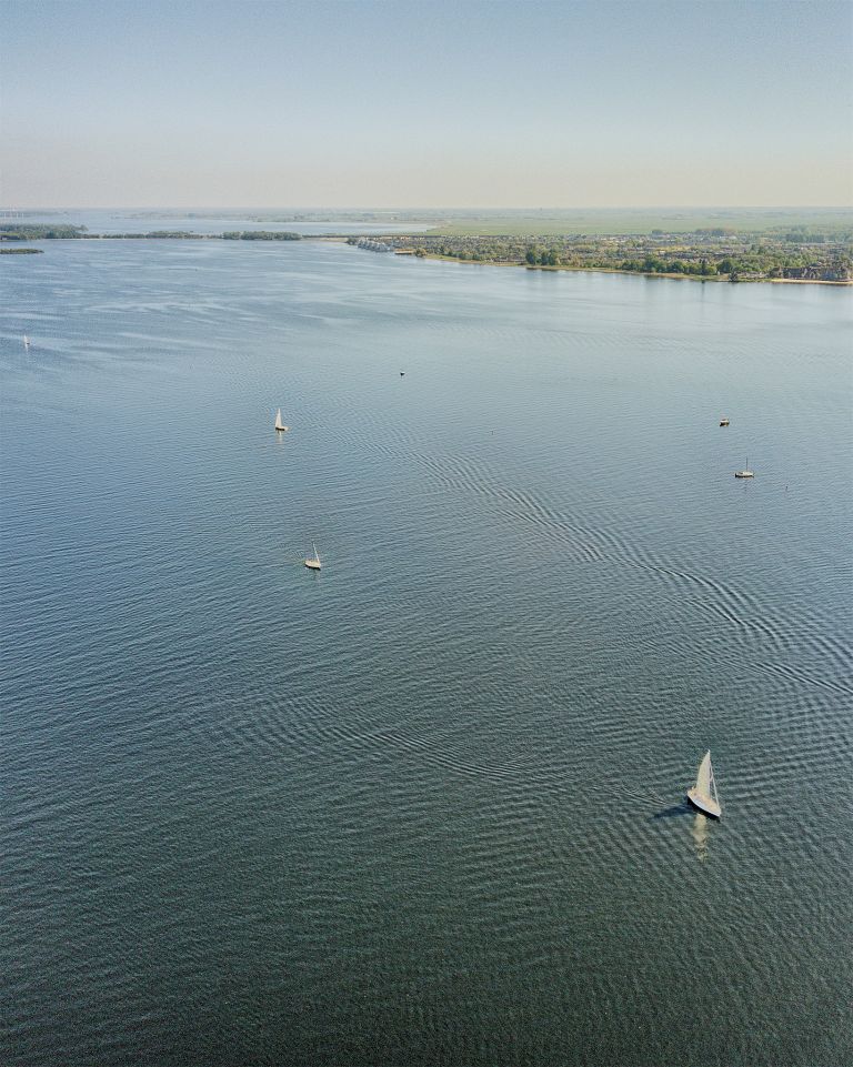 Sailing boats on lake Gooimeer