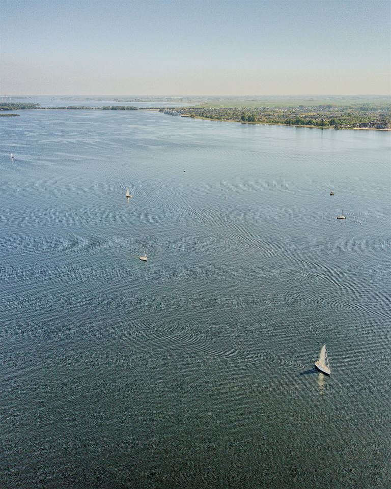 Sailing boats on lake Gooimeer