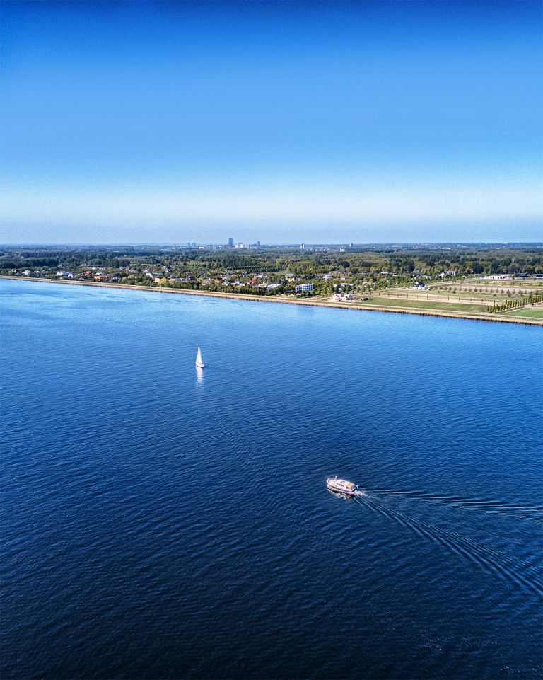 Sailing boats on lake Gooimeer