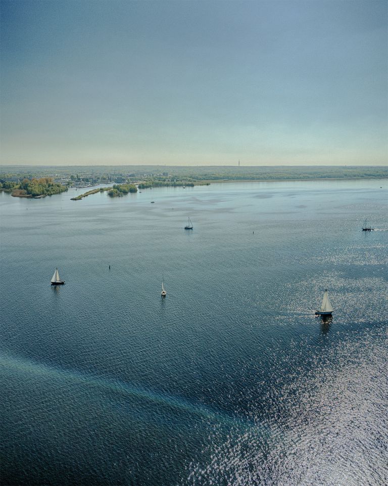 Sailing boats on lake Gooimeer