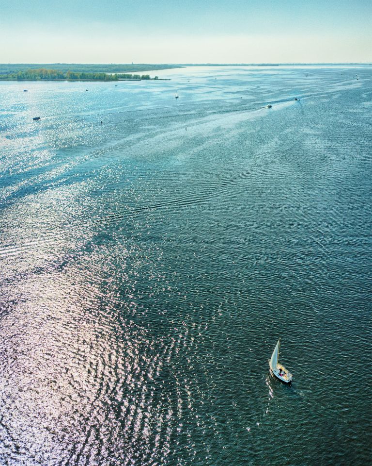 Sailing boats on lake Gooimeer