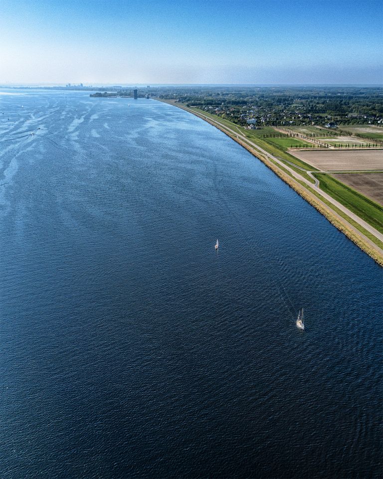 Sailing boats on lake Gooimeer