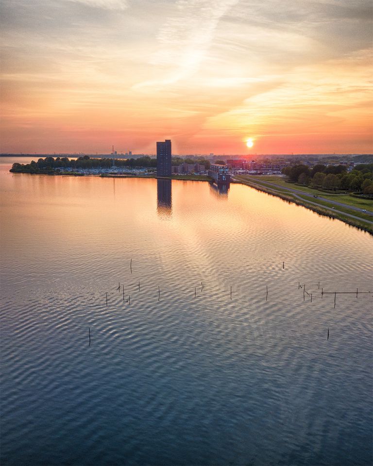 Drone sunset over lake Gooimeer