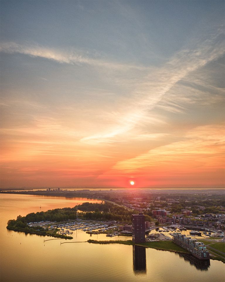 Drone sunset over lake Gooimeer