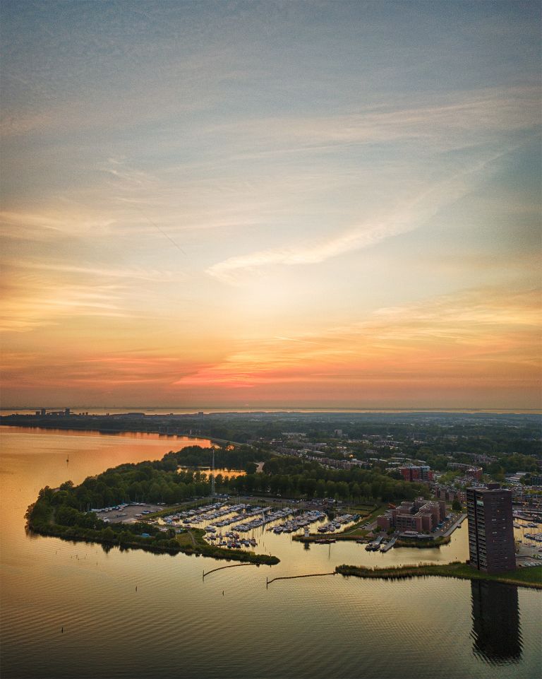 Drone sunset over lake Gooimeer