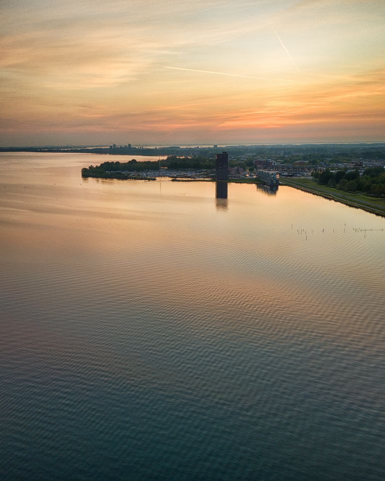 Drone sunset over lake Gooimeer