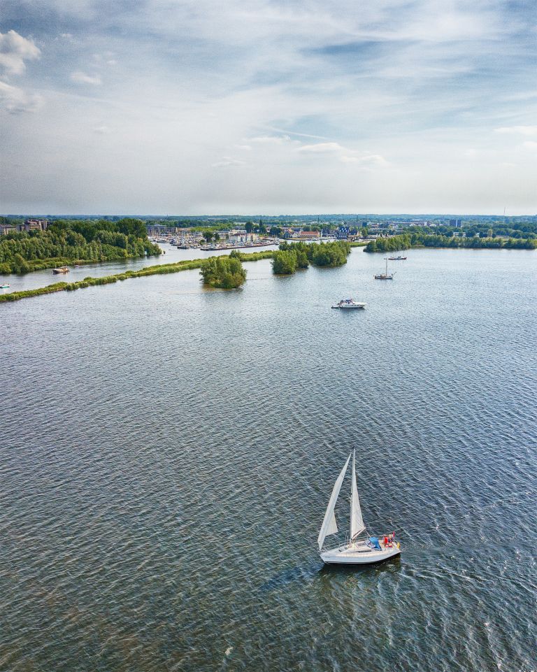 Sailing boat on lake Gooimeer