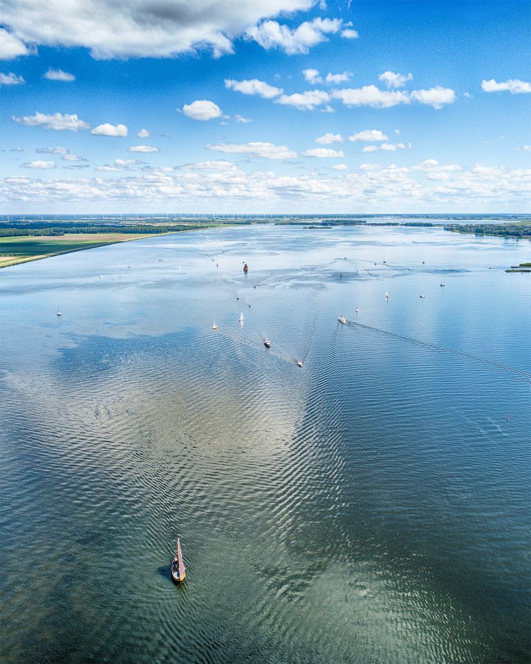 Boats on lake Gooimeer on a summer day