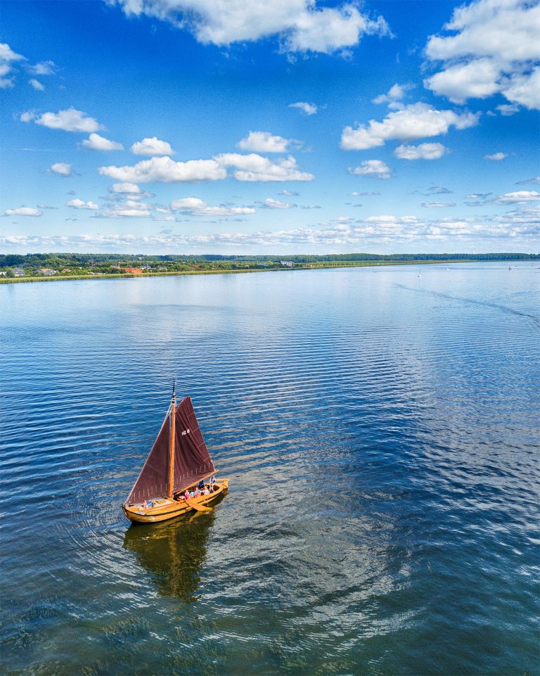 Botter on lake Gooimeer on a summer day