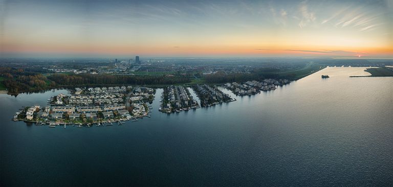 Drone panorama of the Noorderplassen neighbourhood during sunset